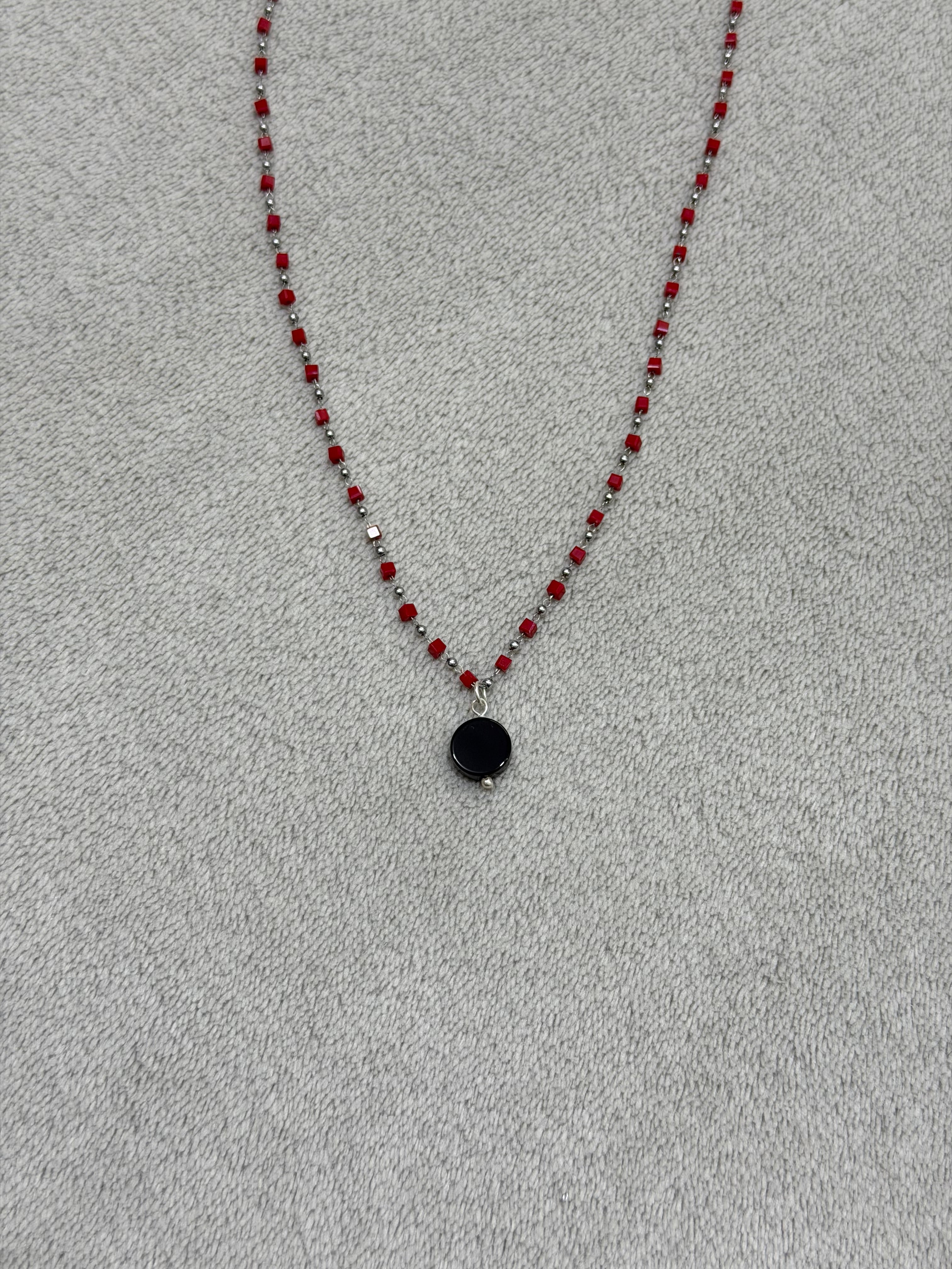 Stainless steel necklace with red beads