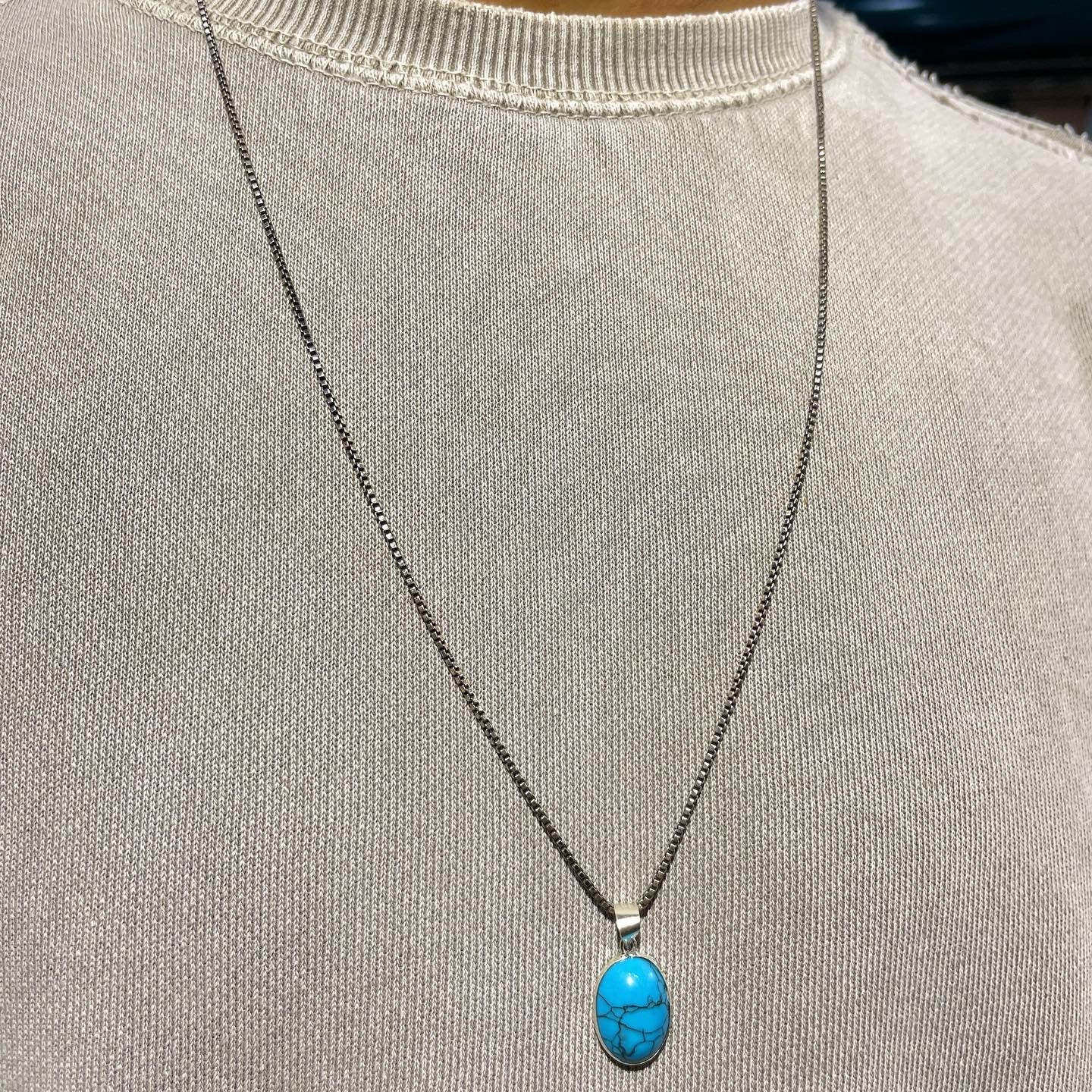 Silver necklace with turquoise stone