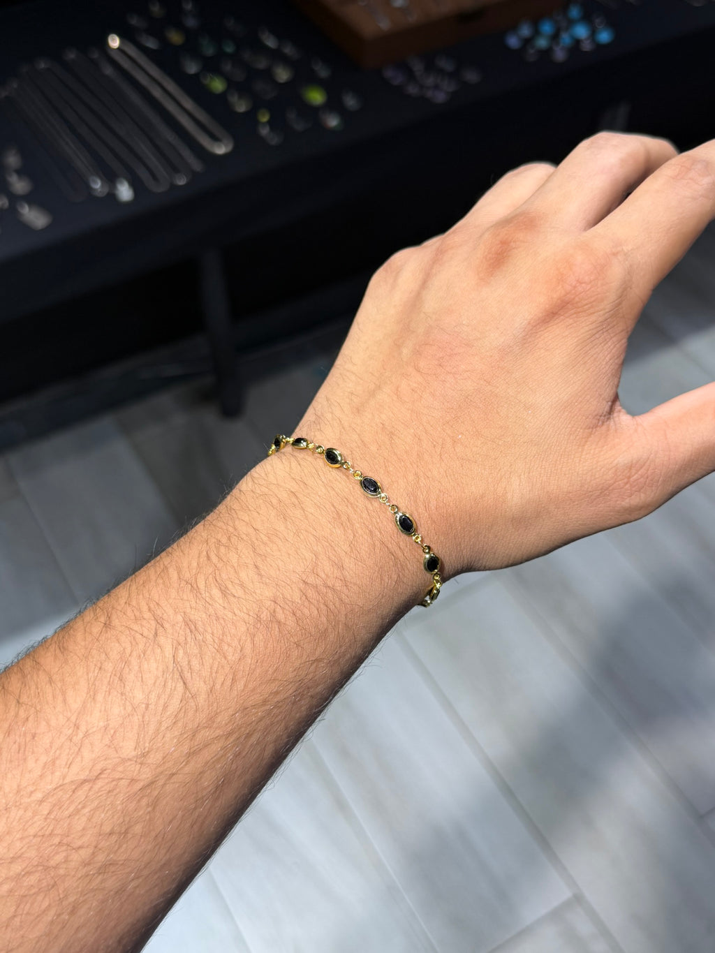 8. Black Oval Gold Bracelet