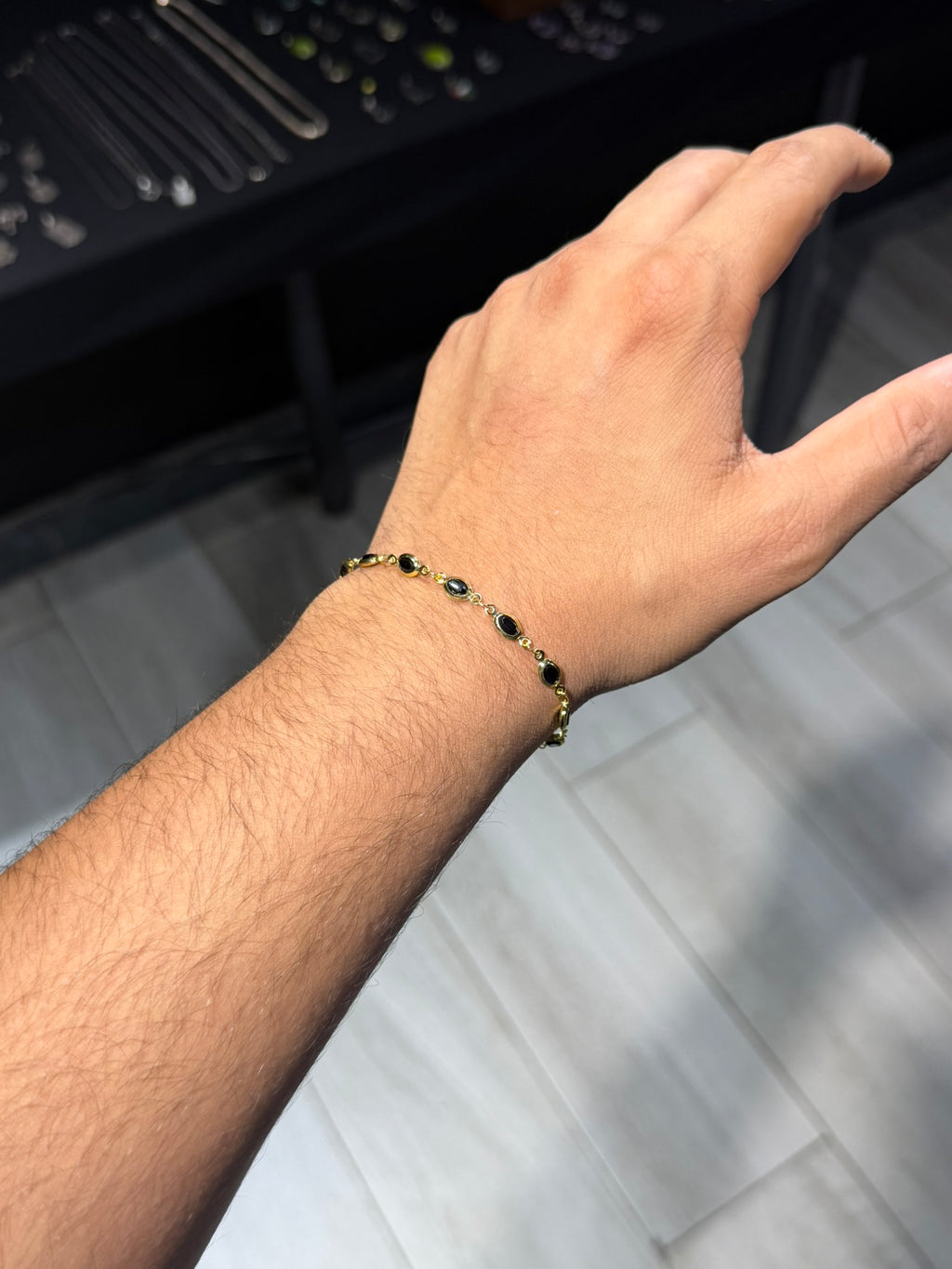 8. Black Oval Gold Bracelet